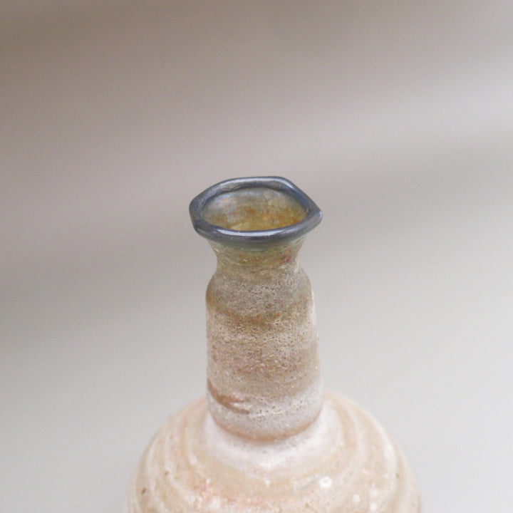 Close-up of  mouth and neck of 1960s Argentinian Mingus Glass Miniature Bottle, amphora.