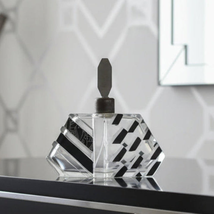 1930s Karl Palda Perfume Atomizer on a reflective surface with a neutral background