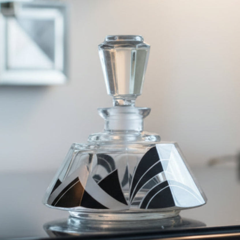 1930s Karl Palda Cologne Bottle & Stopper on a blurred background