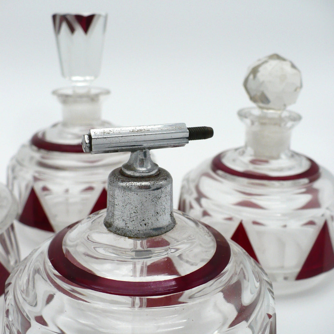 Detail view of the Karl Palda crystal vanity set showing a close-up of atomizer fitting.