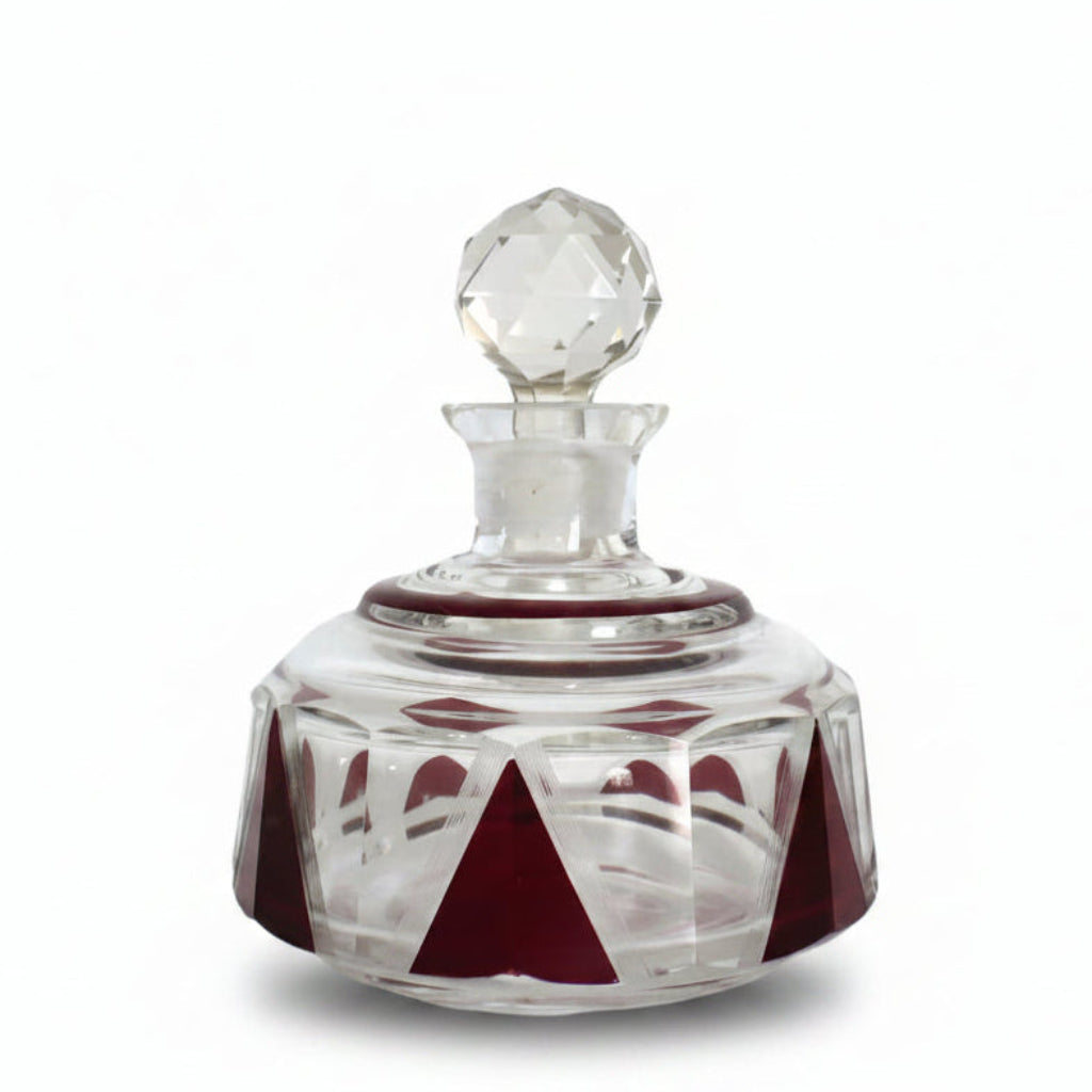 Karl Palda small crystal perfume decanter with a replacement stopper and red geometric enameled panels.