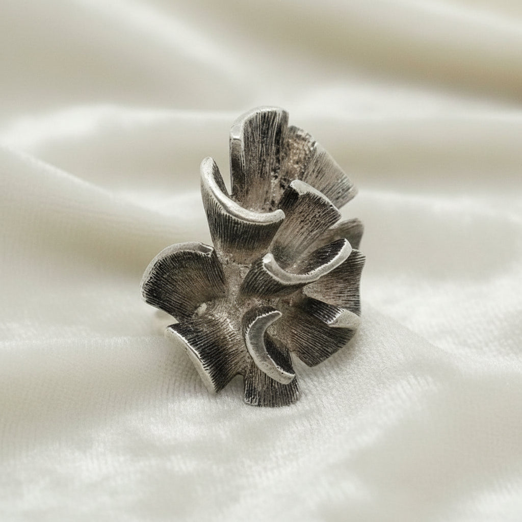 1960s Vintage Brutalist Ring: Industria Argentina front on velvet.