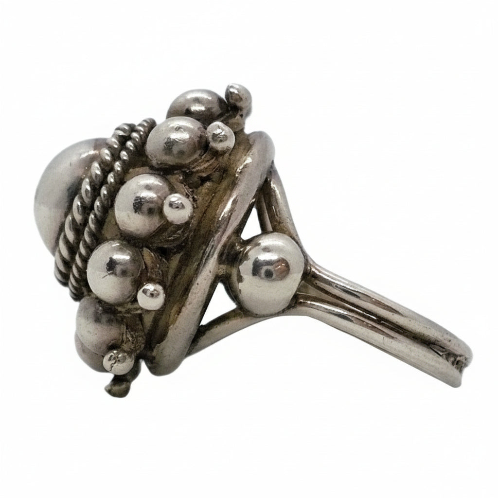 ADJ. Vintage Etruscan Revival Sterling Statement Ring Boho Glam side view.