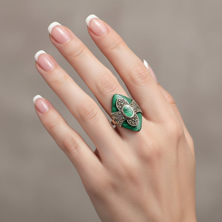 Art Deco Vintage 975 Silver Malachite Cocktail Ring on hand.