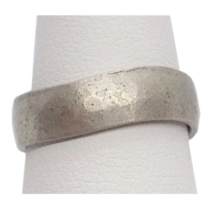 Liberty Coin Viking Style Wedding Band Ring 1980s Vintage Hand Forged, on display stand.