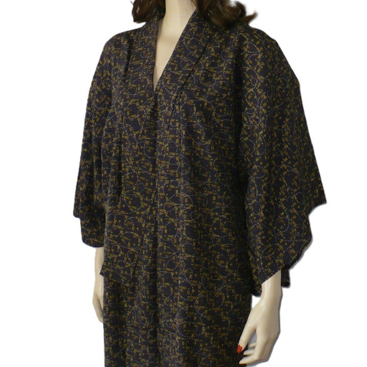 1960s Shōwa Rayon Chirimen Hitoe Kimono on a  mannequin.