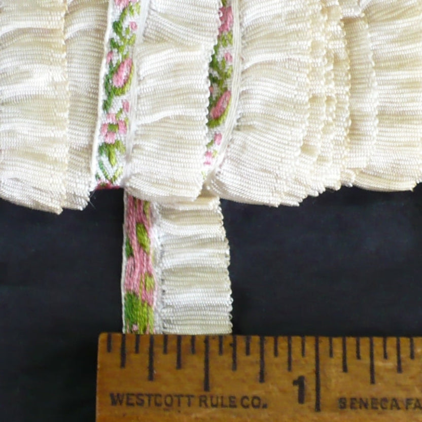 Vintage sewing trim next to ruler to show scale width.
