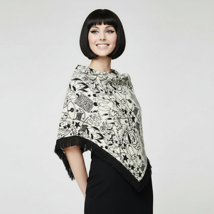 1960s Vintage Black Graphic Holidays Novelty Print Fringed Shawl on model.