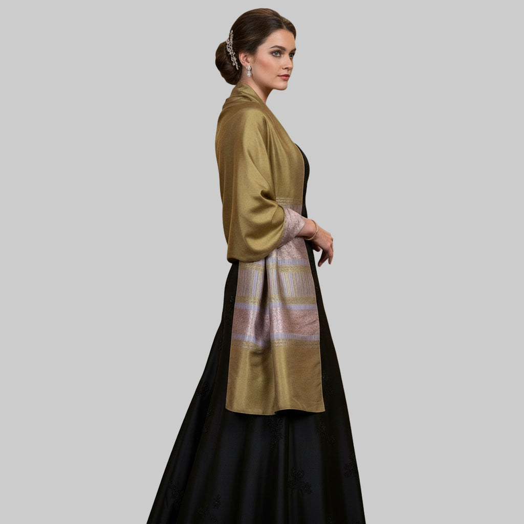 Woman wearing a 1960s Vintage Handwoven Thai Silk Scarf or Shawl t with a g long black dress.on a gray background.