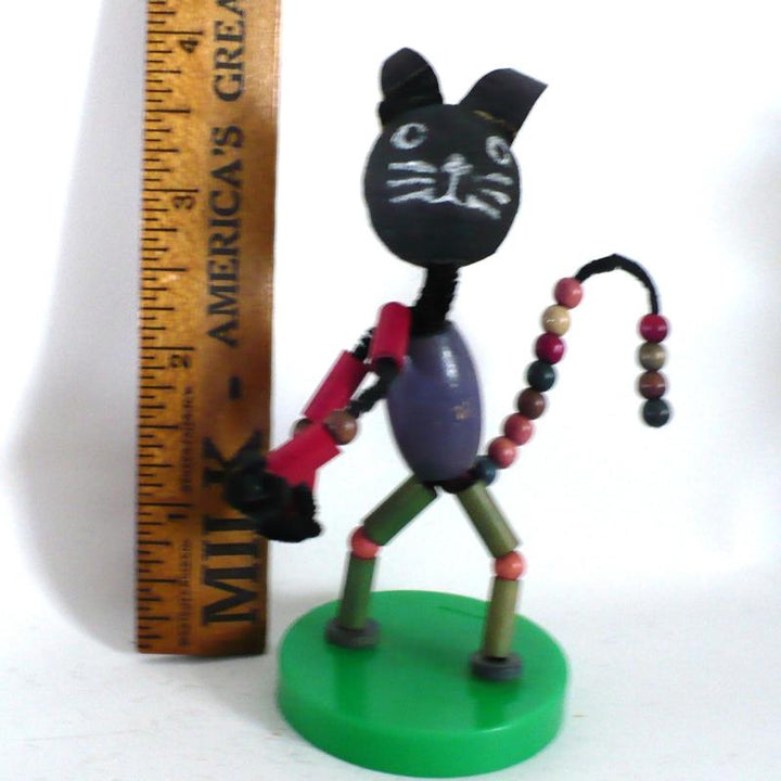 Pipe cleaner doll.