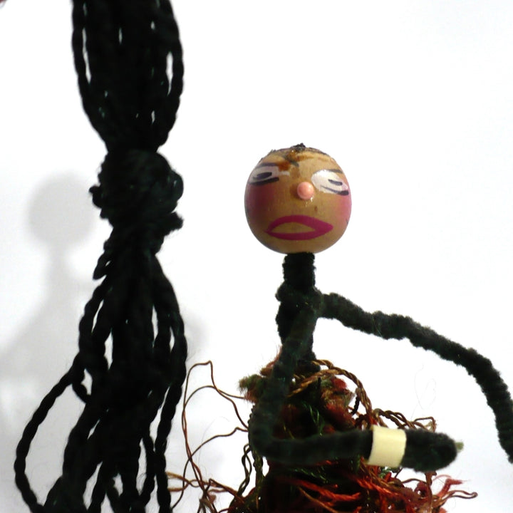 Pipe cleaner doll.