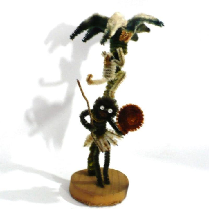 Pipe cleaner doll.