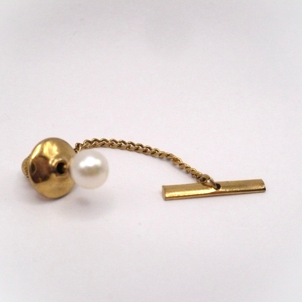 Vintage tie tack with chain and bar.