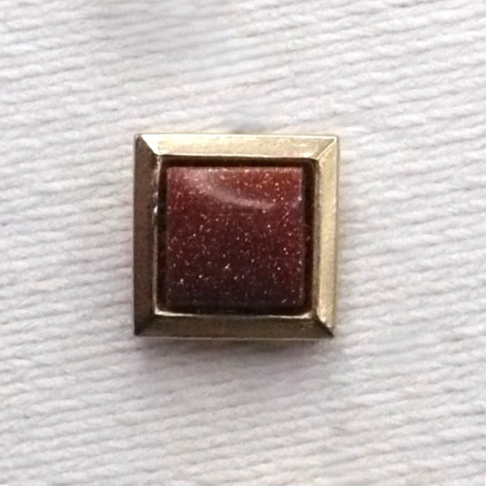 Vintage goldstone old tie tack with chain and bar.