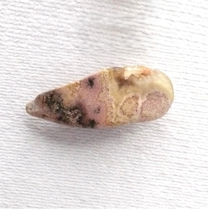 Pink opal tie tack.