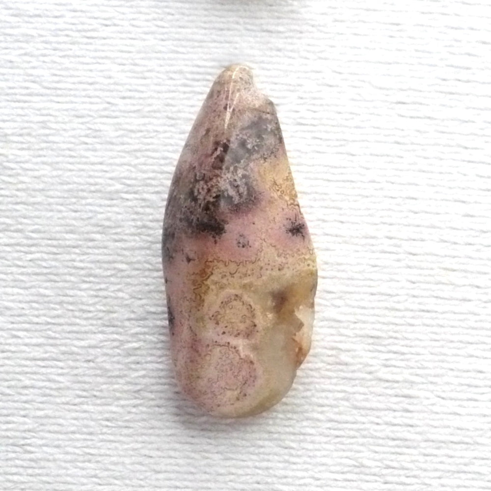 Pink opal tie tack.