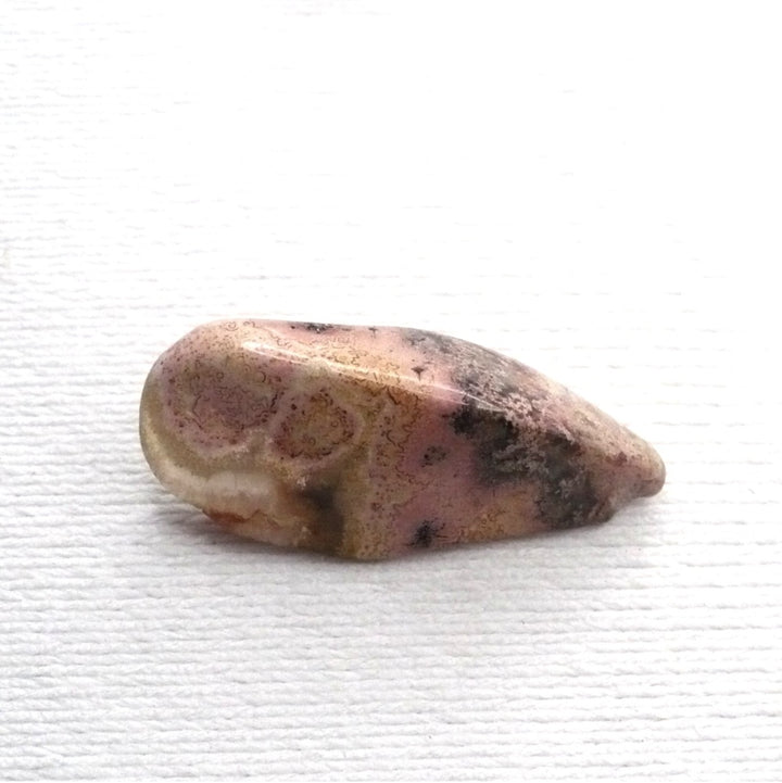 Pink opal tie tack.