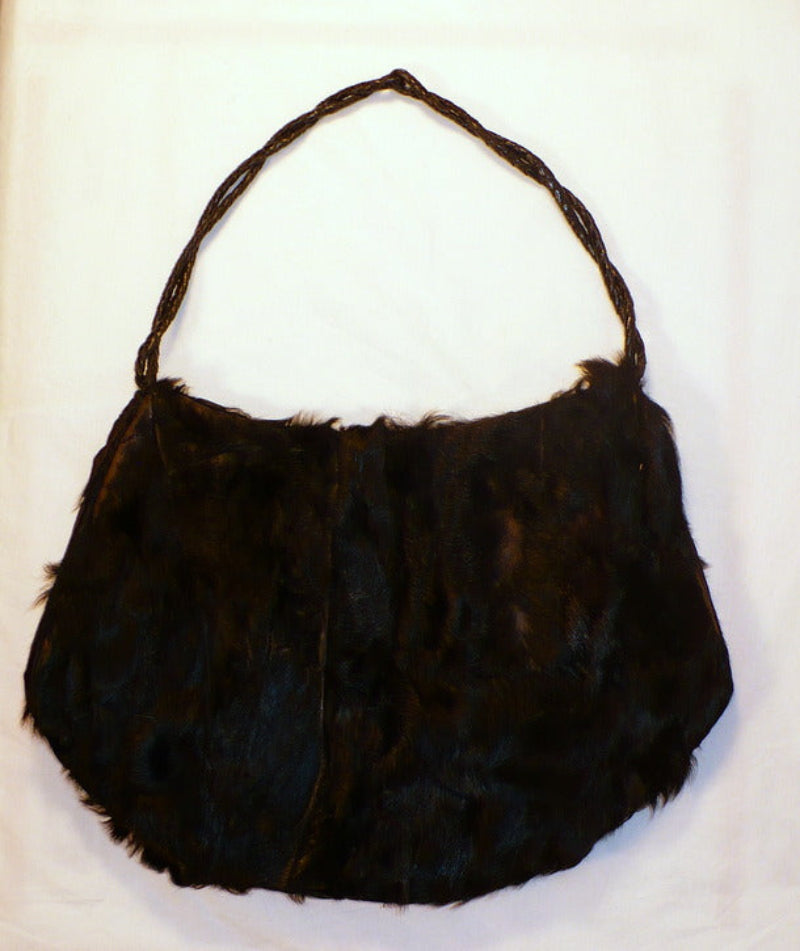 Black fur muff, front view.