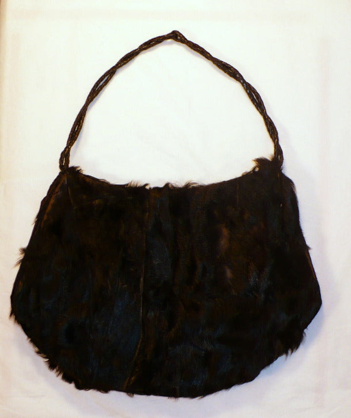 Black fur muff, front view.