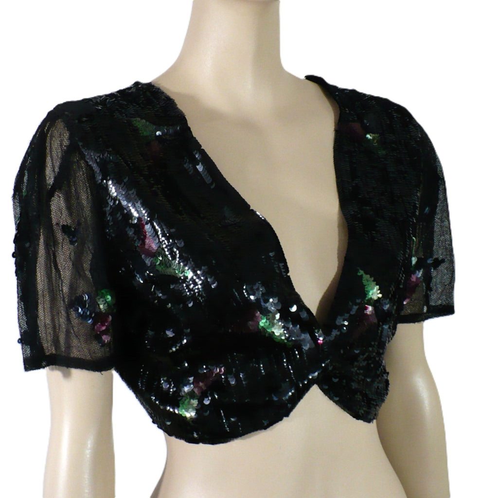 1930s vintage Old Hollywood Glamour gelatin sequins evening bolero on a mannequin, shown fastened.