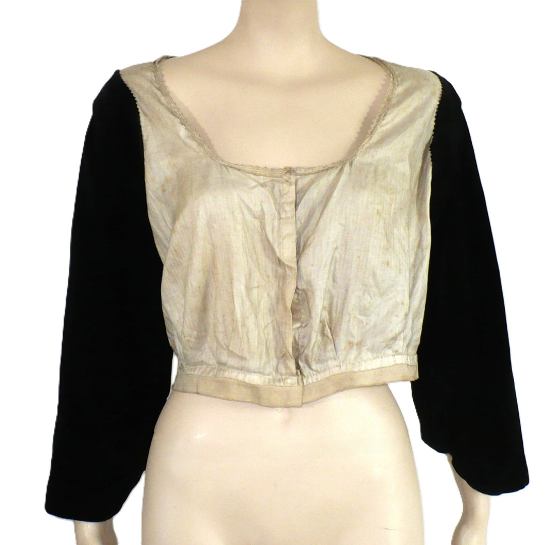 Front view 1890s Aesthetic Reform Dress Foundation Bodice Blouse on mannequin with plain background.