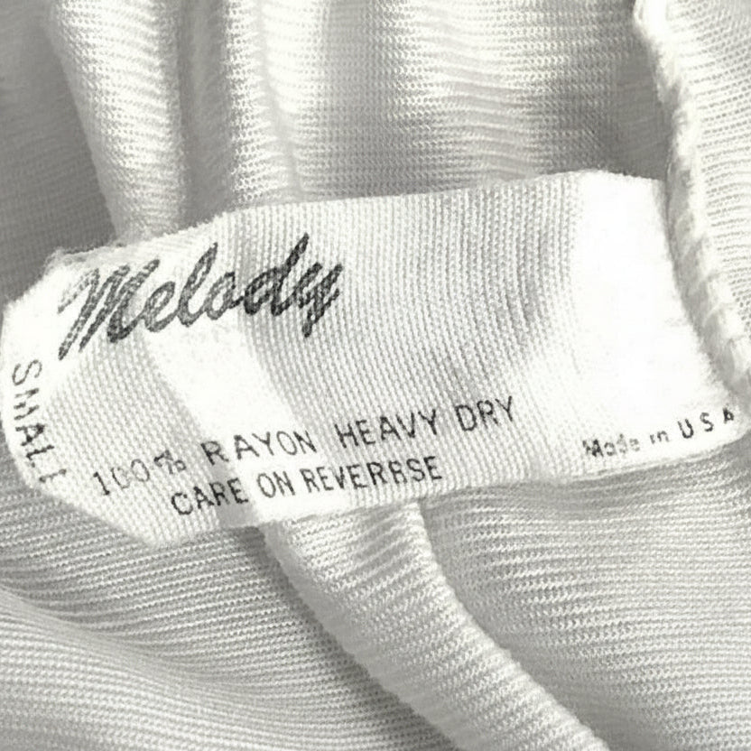 Small 1970s Vintage Lacy Front Slit White Nylon Half Slip, Made in USA.