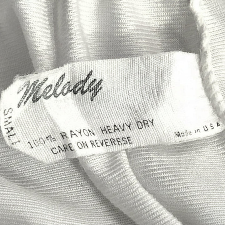 Small 1970s Vintage Lacy Front Slit White Nylon Half Slip, Made in USA.