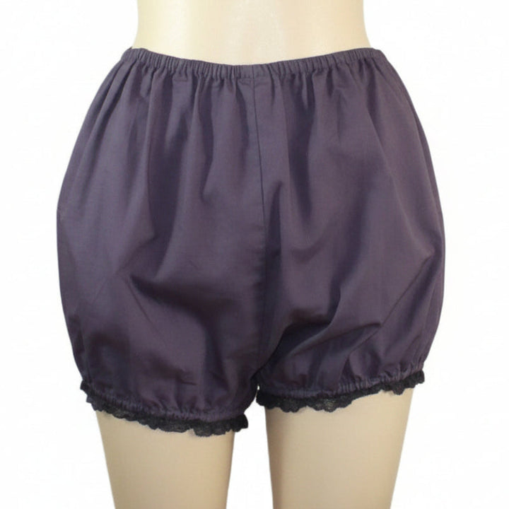 Purple bloomers on a mannequin against a white background