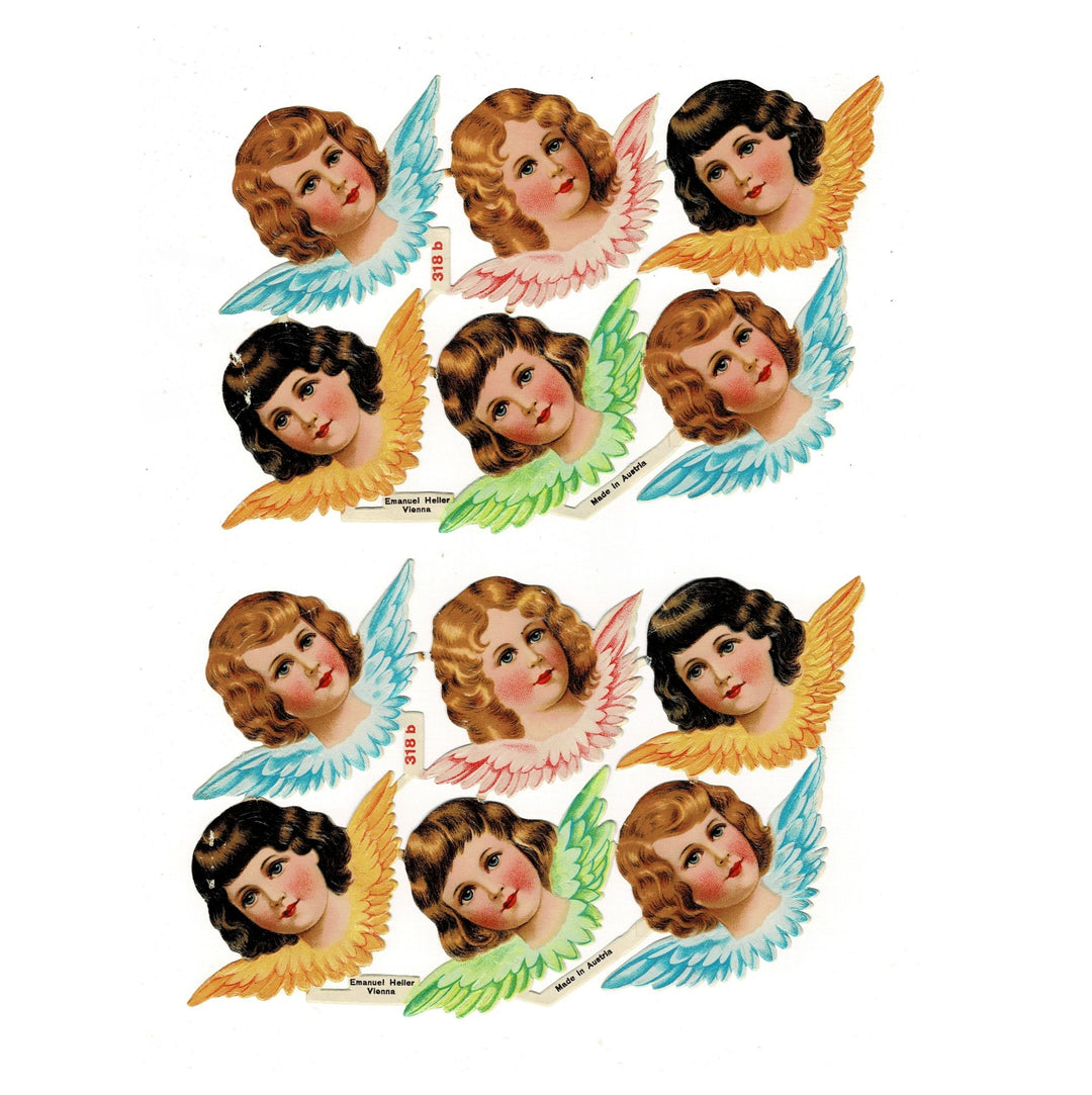 This image shows two sheets of vintage Austrian embossed paper die-cut  cherub angels.