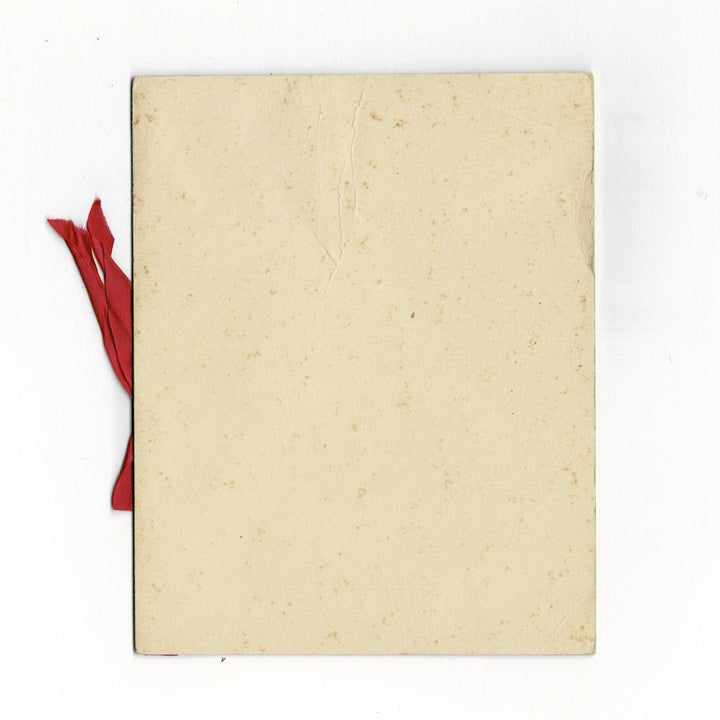 This elegant vintage Christmas card, titled Sweetheart Mine, features a sentimental holiday message for a romantic partner. The interior is decorated with a vibrant red poinsettia and holly sprig at the top, accompanied by delicate floral accents around the verse. The red satin ribbon from the cover is visible, serving as a decorative tie for the panels. back side.