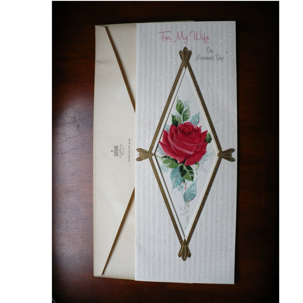 Greeting card with a red rose design on a wooden surface, 1960s Jumbo Vintage Mother’s Day Card for Wife w/ Glitter by Gibson.