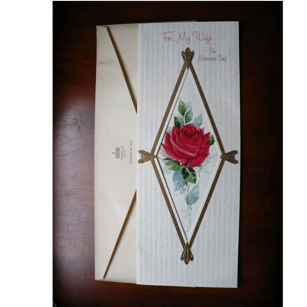 Greeting card with a red rose design on a wooden surface, 1960s Jumbo Vintage Mother’s Day Card for Wife w/ Glitter by Gibson.