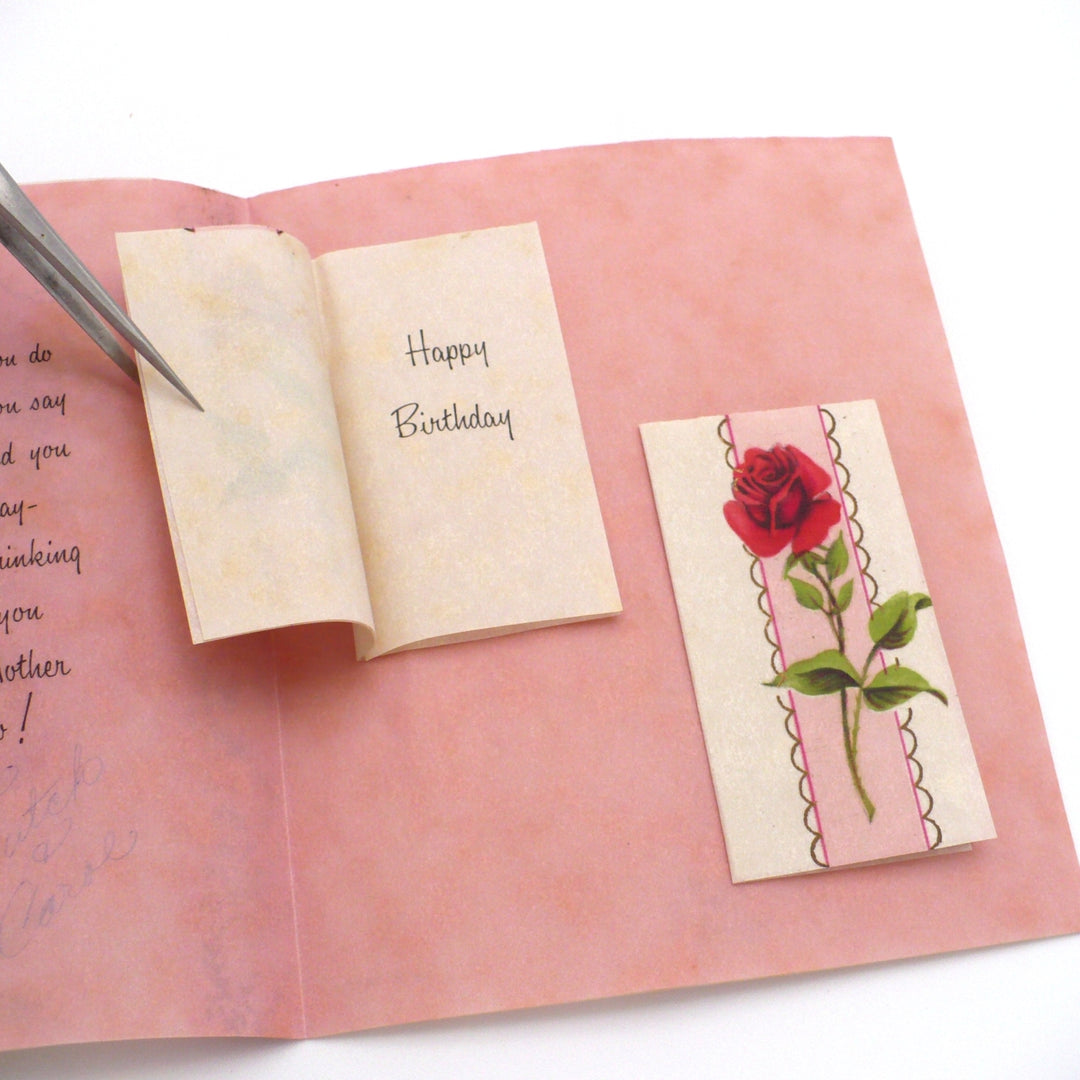 Greeting card with red roses and a pink ribbon on a white background, 1950s Mother’s Birthday Vintage Greeting Card w/ Red Roses & Sugar Glitter by Buzzo.