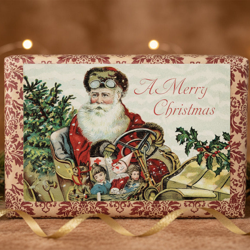 1910 Santa & Toys In A Roadster Car Vintage Christmas Postcard, shown as a gift topper.