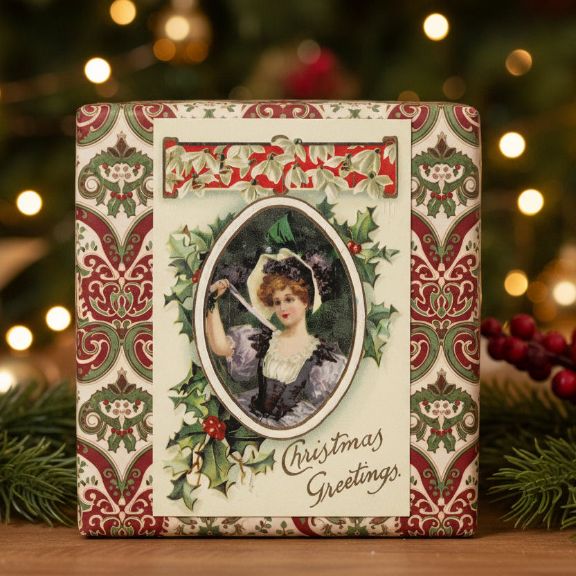 1912 Christmas Cameo and Snowdrops Vintage Holiday Postcard, set against a festive background.