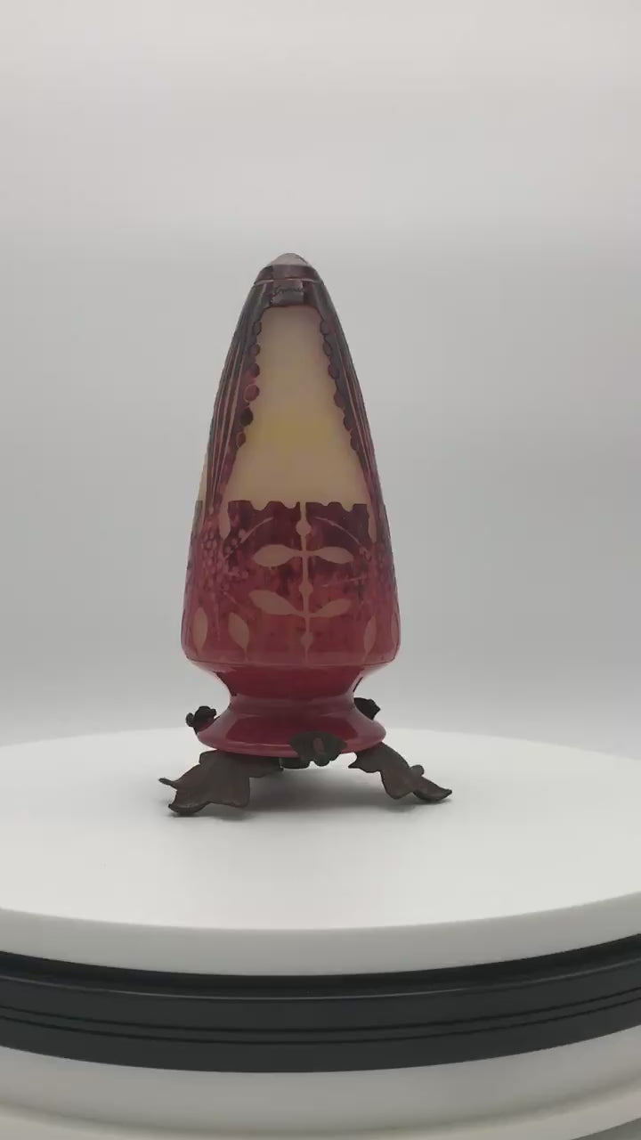 1923-26 Le Verre Français Veilleuse Amarantes Night Light on original iron stand , spinning slowly on a rotating base.