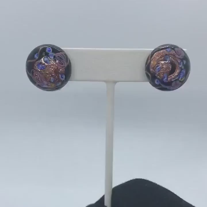 Video of 1950s Black Murano Glass Earrings - Screwback on a display stand.