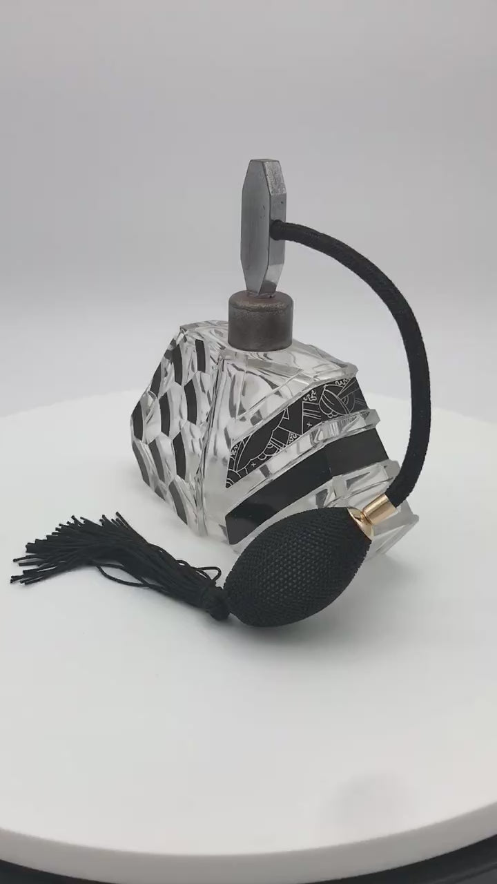 Black Karl Palda 1930s Art Deco Crystal Atomizer video in a rotating display.