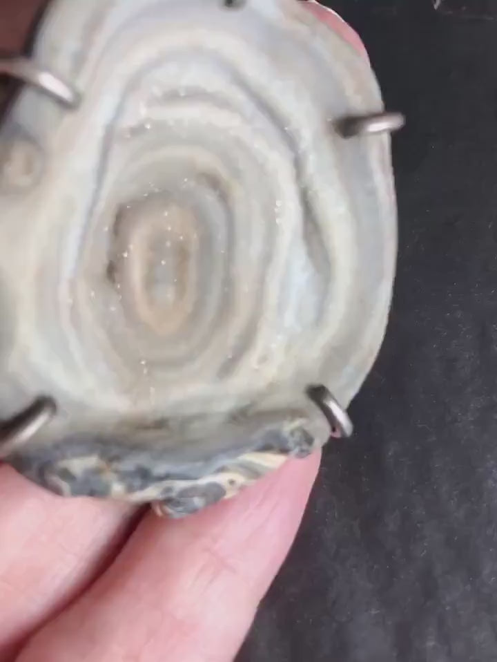 Video of sparkling of 1960s Chalcedony Rose Druzy Pendant .